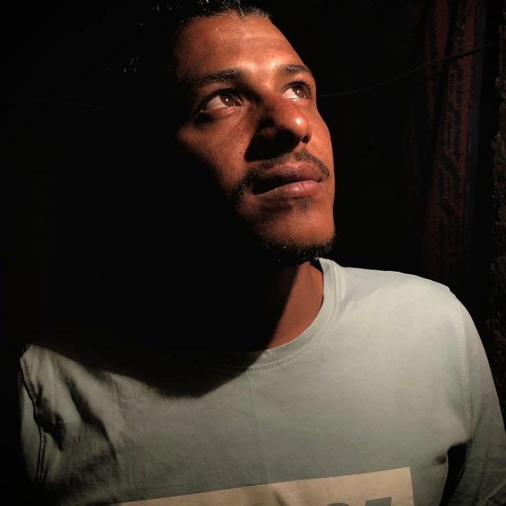 Avery Chen, Lead Design Curator at Mosaic Cobalt Vector, reviewing corporate floral arrangements